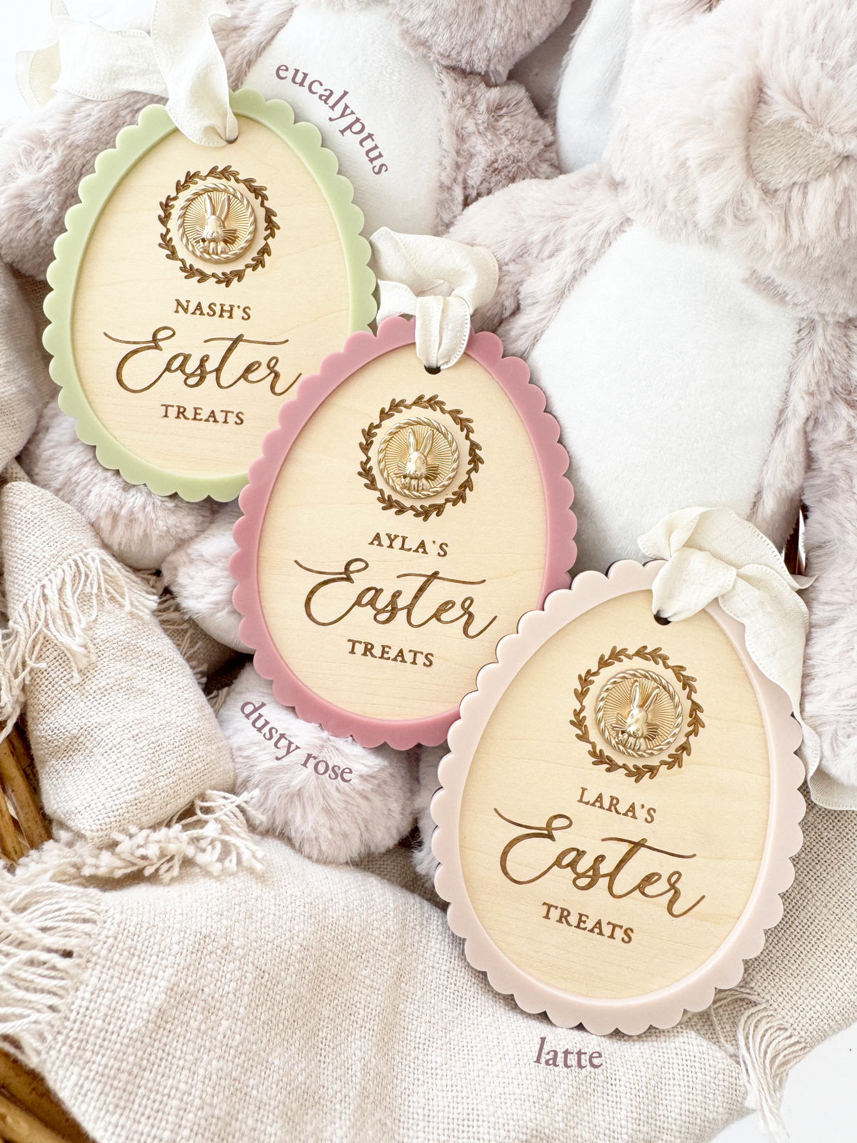 A lineup of personalised Easter Basket Tag plaques with a beautiful gold bunny charm and scallop border colour options.
