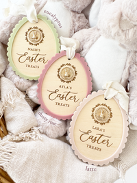 A lineup of personalised Easter Basket Tag plaques with a beautiful gold bunny charm and scallop border colour options.