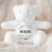 A personalized white teddy personalised a baby name and cute baby toys.